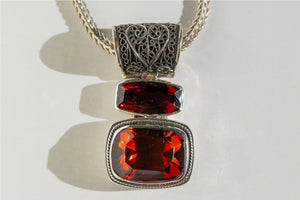 Casbah  Baltic Amber & Garnet pendant on 18-20" handwoven foxtail chain